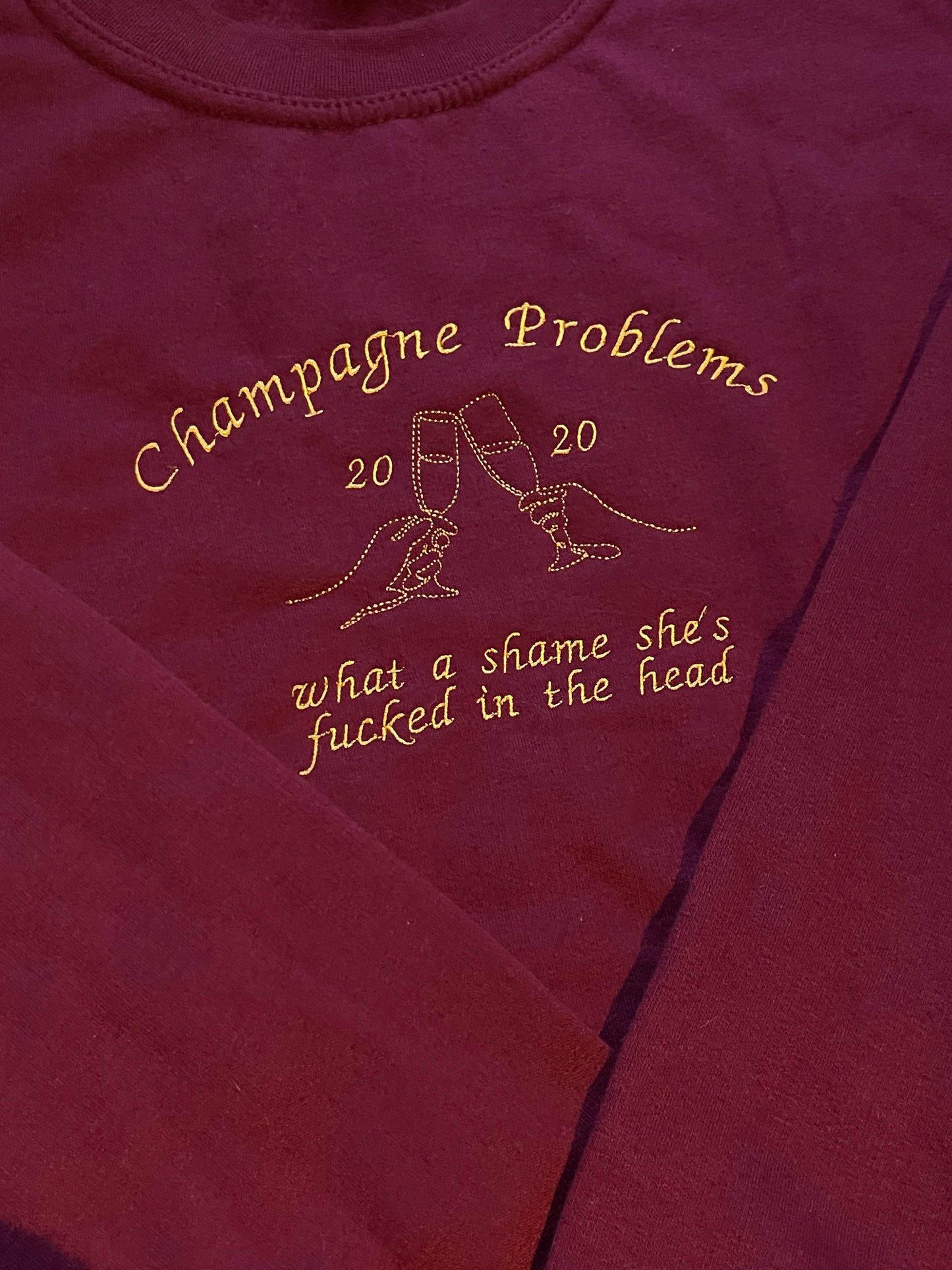 Champagne Problems, what a shame she's f***** in the head, EMBROIDERED , Crewneck Sweatshirt