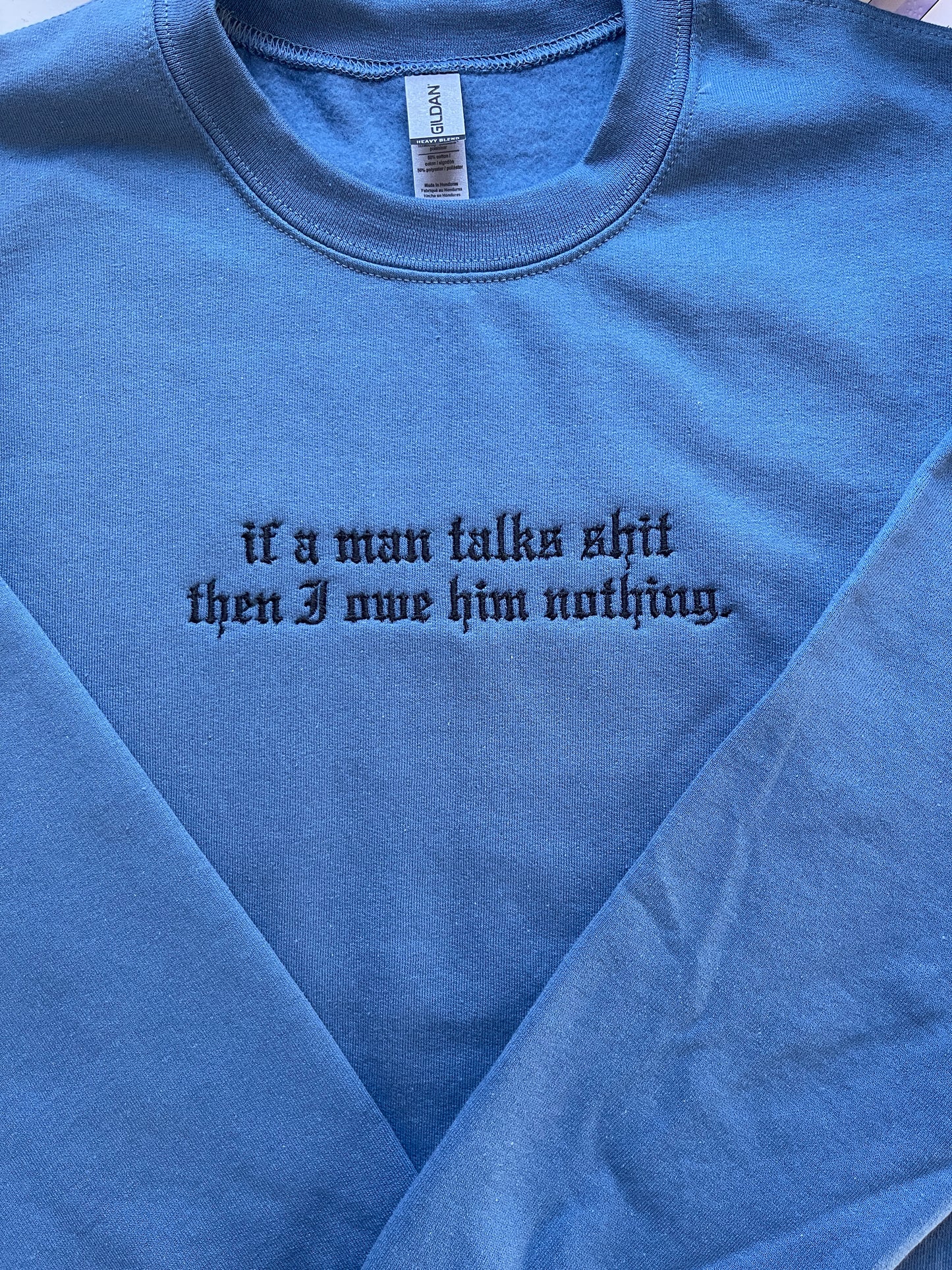 If a man talks shit then I owe him nothing, reputation - EMBROIDERED Crewneck Sweatshirt