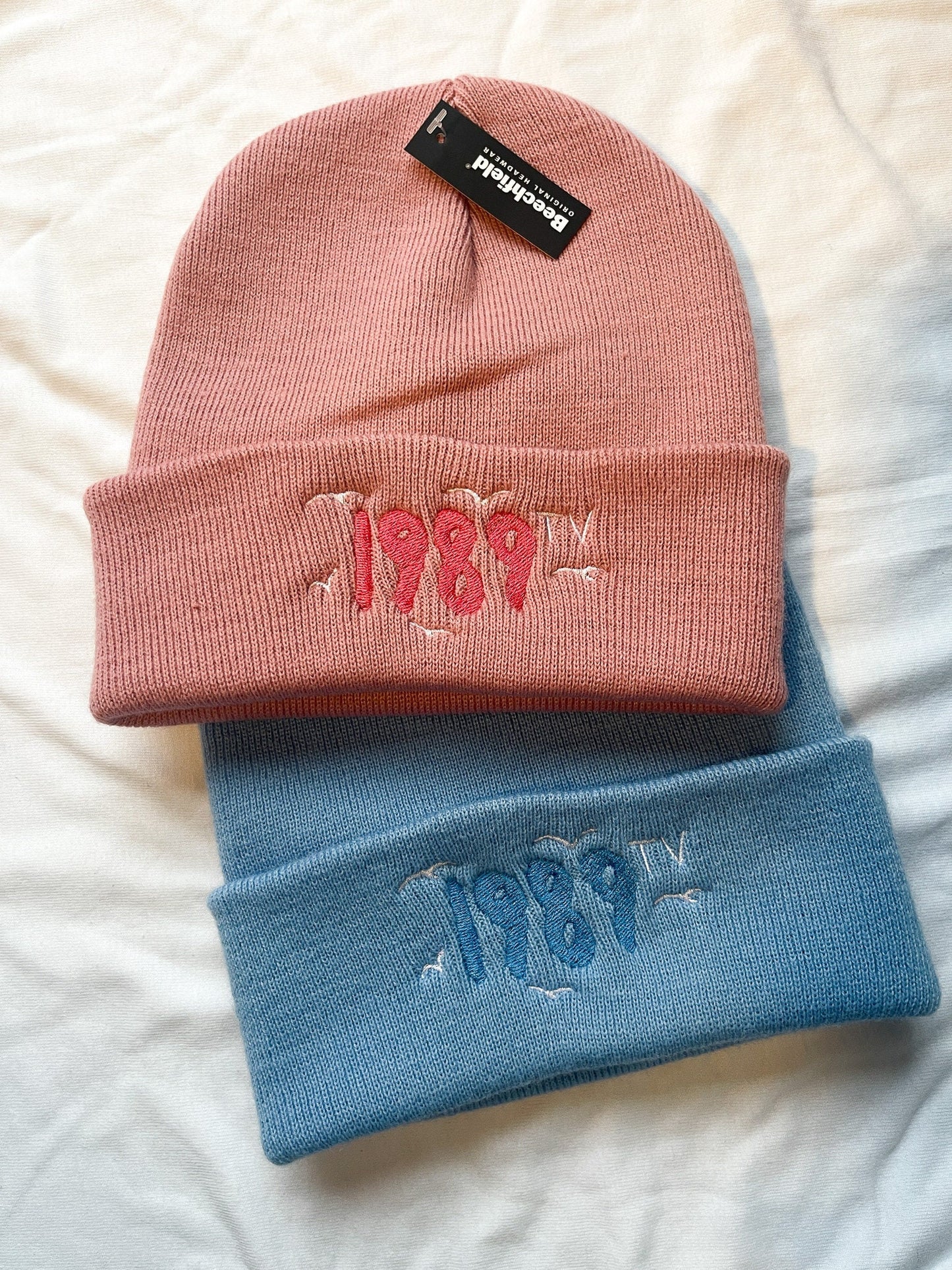 Embroidered 1989 beanie, Crystal Skies Blue, Rose Garden Pink